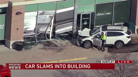 Driver crashes into business at Huntley strip mall